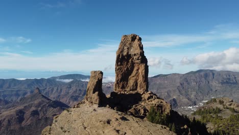 Flight-over-of-Roque-Nublo,-a-volcanic-rock-in-caldera-of-Tejeda,-Gran-Canaria,-Canary-islands,-Spain