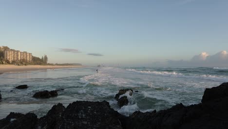 26-Feb-2023---Gold-Coast,-Queensland,-Australia:-View-from-Currumbin-Beach-Vikings-Surf-Life-Saving-Club-along-Currumbin-Beach-at-sunrise