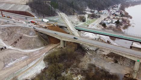 Demolishing-A1-highway-bridge-in-Kaunas-city,-aerial-drone-view