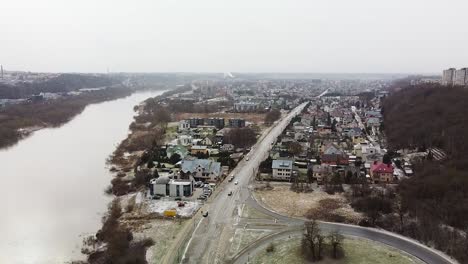 Viljampole-district-in-Kaunas-city,-aerial-drone-view-during-snowfall