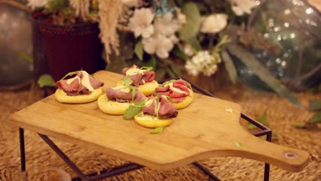 Ham-appetizers-on-a-wooden-table