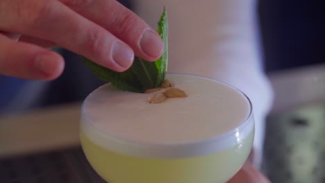 Bartender-prepares-a-cocktail-with-peppermint