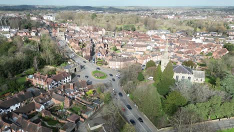 High-angle-panning-shot-Warwick-market-town,-Warwickshire-UK-Drone,-Aerial