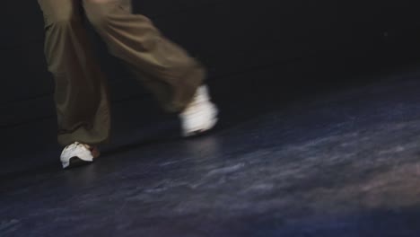 modern-contemporary-dance-feet-close-up-moving-fast-hip-hop-music-rhythm-on-stage
