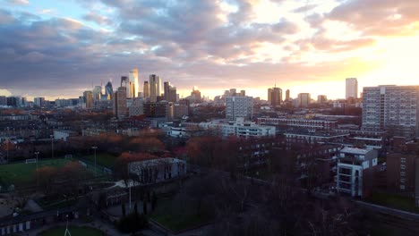 Drone-shot-flying-over-Haggerston-Park-with-City-of-London-in-distance