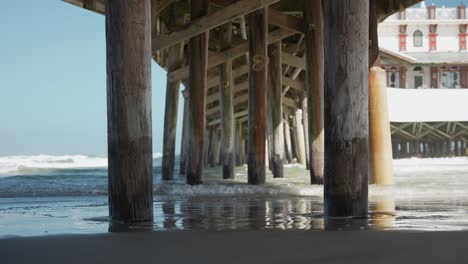 People-walking-under-the-pier-structure