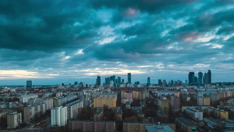 Zooming-timelapse-of-clouds-moving-over-the-skyline-of-Warsaw-during-a-sunset