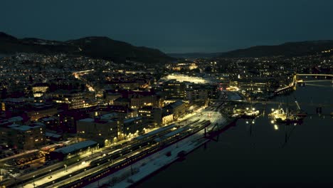 Night-timelapse-of-the-railway-station-and-bridge-under-construction-in-the-port-city-of-Dramen-in-Norway