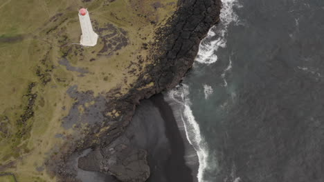 Dramaric-Icelandic-landscape-with-lighthouse-on-the-cliffs