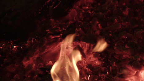 Close-up-of-smoldering-embers-in-a-campfire
