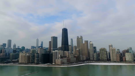 Aerial-view-around-the-Streeterville-skyline,-partly-sunny-day-in-Chicago,-USA---orbit,-drone-shot