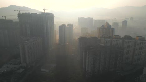 Kashimira-Mira-road-thane-city-top-moving-bird-eye-view-in-early-morning-mumbai-morning-mist-fog-winter-sun-rays