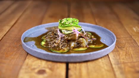 Aguachile-plate,-traditional-Mexican-dish-on-a-wooden-table