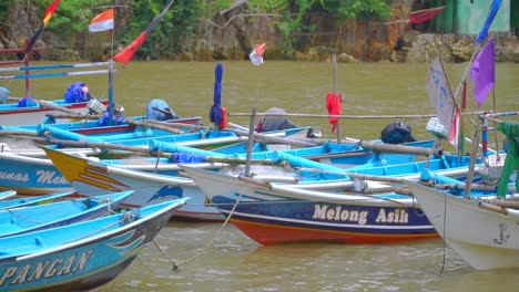 Many-traditional-fisherman-boats-parked-on-the-harbor---Indonesia-traditional-fisherman