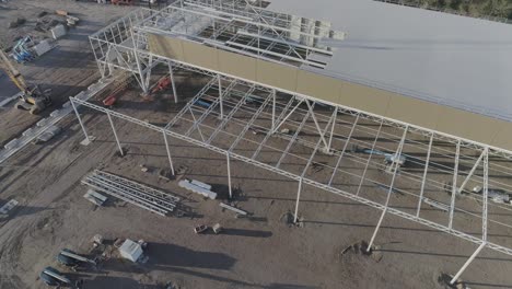 Drone-shot-of-construction-site-with-metal-framework