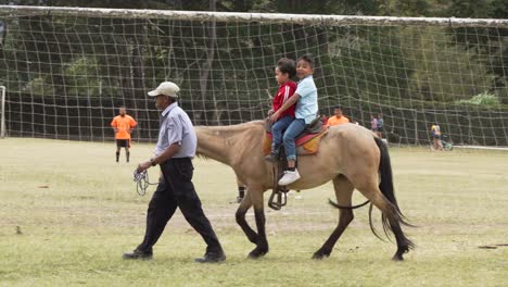 Children-Riding-Horse-in-La-Sabana-Park-in-San-Jose-Costa-Rica