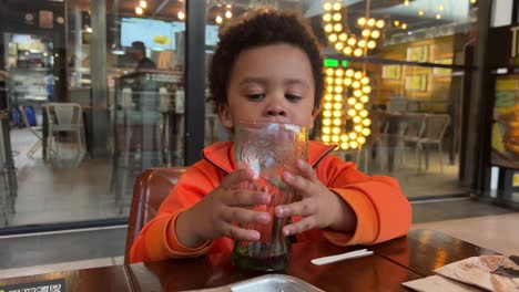 Two-year-old-exotic-black-baby-tastes-CocaCola-for-the-first-time
