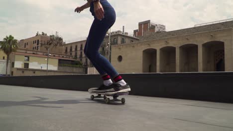 Skater-girl--doing-kickflip-trick-in-slow-motion