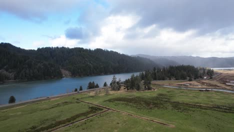 Beautiful-4K-aerial-shot-showcasing-landscape-at-Dean-Creek-in-Reedsport,-Oregon