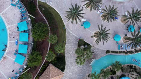 Aerial-view-above-the-pool-area-at-the-Champions-Gate-resort,-in-Orlando,-Florida,-USA---cenital,-drone-shot