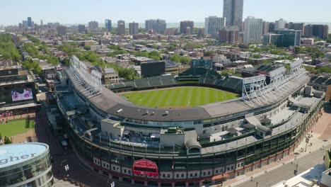 Drone-Flies-Above-Iconic-Wrigley-Field-and-Red-Marquee-on-Summer-Day