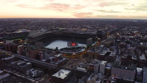Beautiful-Aerial-View-Above-Wrigley-Field-at-Sunset,-Winter