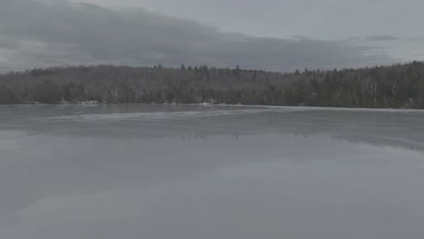Lake-Hebron-completely-frozen-over-in-ice-Orbitting-aerial-shot