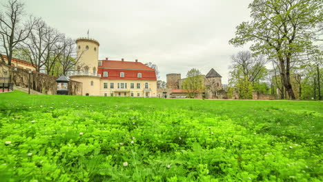 Trucking-timelapse-of-tourism-walking-at-the-Cesis-Castle-in-Latvia