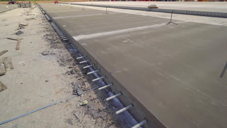 A-new-paved,-reinforced,-concrete-road-surface
