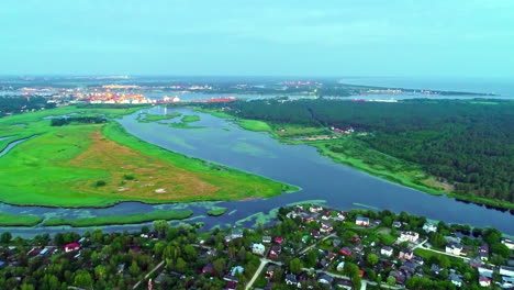 Colorful-nature-area-in-Latvia-with-in-the-background-the-industrial-lights