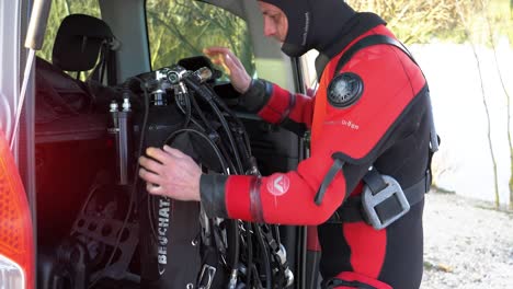 A-diver-tests-his-oxygen-cylinder-equipment