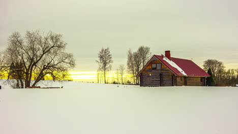 Motion-blur-timelapse-setting-sun-disappearing-behind-clouds-in-winter-time