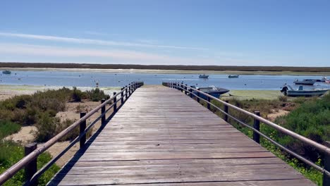 Walkway-to-the-sea,-warm-summer-days-Algarve-Portugal