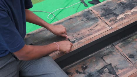 cleaning-the-wooden-board-closeup-view