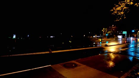 Vehicles-on-a-rainy-night-along-a-suburban-Sydney-street