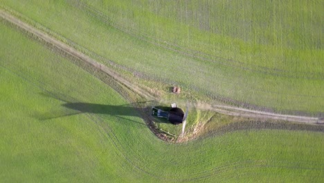 Pitstone-windmill-rotating-rising-aerial-view-above-rural-Buckinghamshire-National-trust-landmark