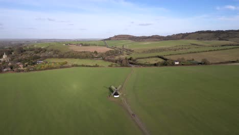 Establishing-Pitstone-windmill-aerial-view-orbiting-Buckinghamshire-landmark-British-rural-countryside