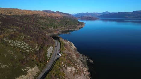 Flying-along-the-road-to-Kyle-of-Lochalsh-with-traffic-in-Scottish-Highlands