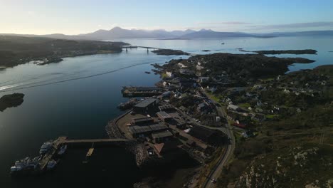 High-altitude-approach-to-Kyle-of-Lochalsh-with-Skye-bridge-and-Cuillin-mountains-Scottish-Highlands