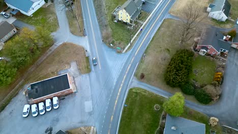 Aerial-view-of-car-crossing-traffic-intersection