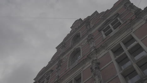 Random-shot-of-the-Borson-building-in-Copenhagen-filmed-from-below-on-a-cloudy-day-LOG