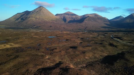 Fast-rise-over-scottish-winter-moorland-towards-Red-Cuillin-mountains-at-sunrise-at-Sligachan-on-the-Isle-of-Skye-Scotland