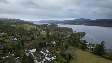 Aerial-Elevated-view-of-Windermere-and-the-town-of-Bowness-Lake-District-England