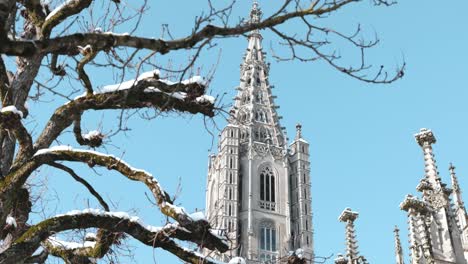 View-of-the-top-of-the-cathedral-in-Bern,-Switzerland-during-a-sunny-winter-day