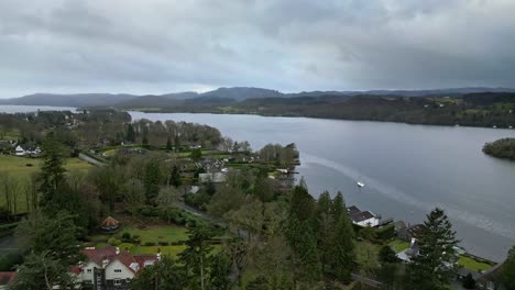 Aerial-Elevated-view-of-Windermere-and-the-town-of-Bowness-Lake-District-England