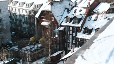 snow-covered-rooftops-of-traditional-Swiss-houses-in-the-old-town-of-Bern,-switzerland-on-a-sunny-day
