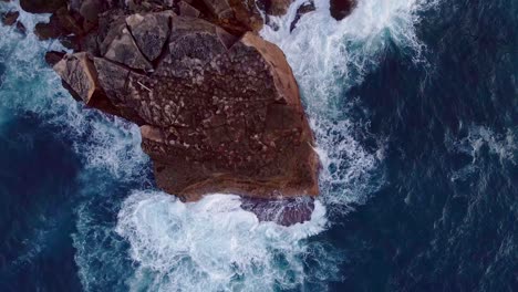 Sharp-rocks-laying-along-the-coastline-of-Menorca-Spain