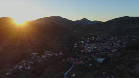 Greek-village-between-mountains-at-during-golden-hour