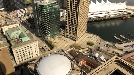 Aerial-Time-lapse-of-Vancouver-harbour-tower-and-Canada-place-on-sunny-day