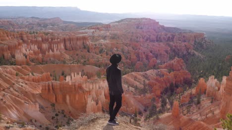 Tourist-with-black-clothes-look-at-hoodoos-in-Bryce-Canyon-National-Park-in-Utah,-United-States-of-America---slow-motion